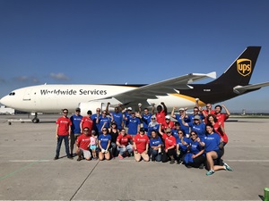 Employees at a plane pulling event
