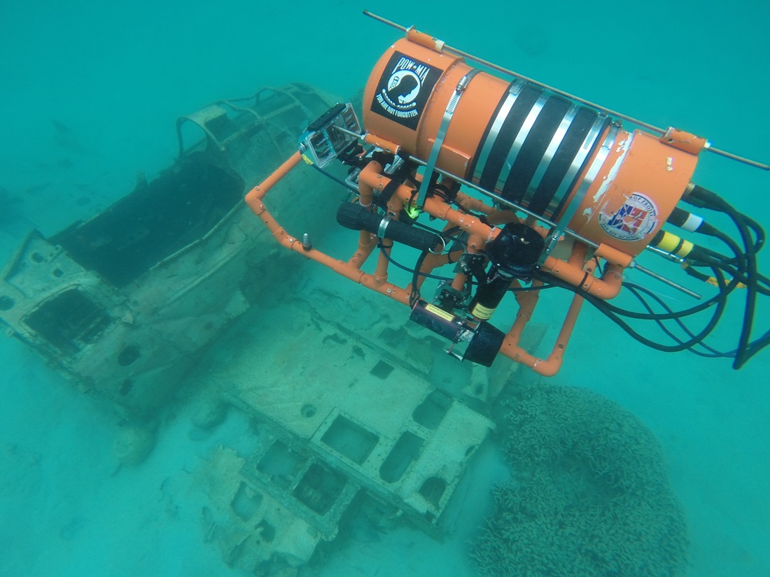 Underwater camera and sunken plane