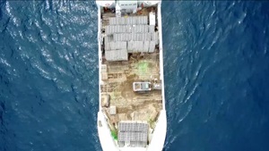 Boat carrying concrete ties for artificial reef