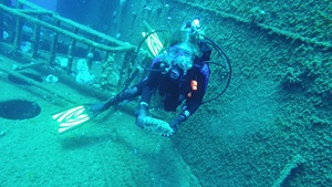 Diver and submerged boat