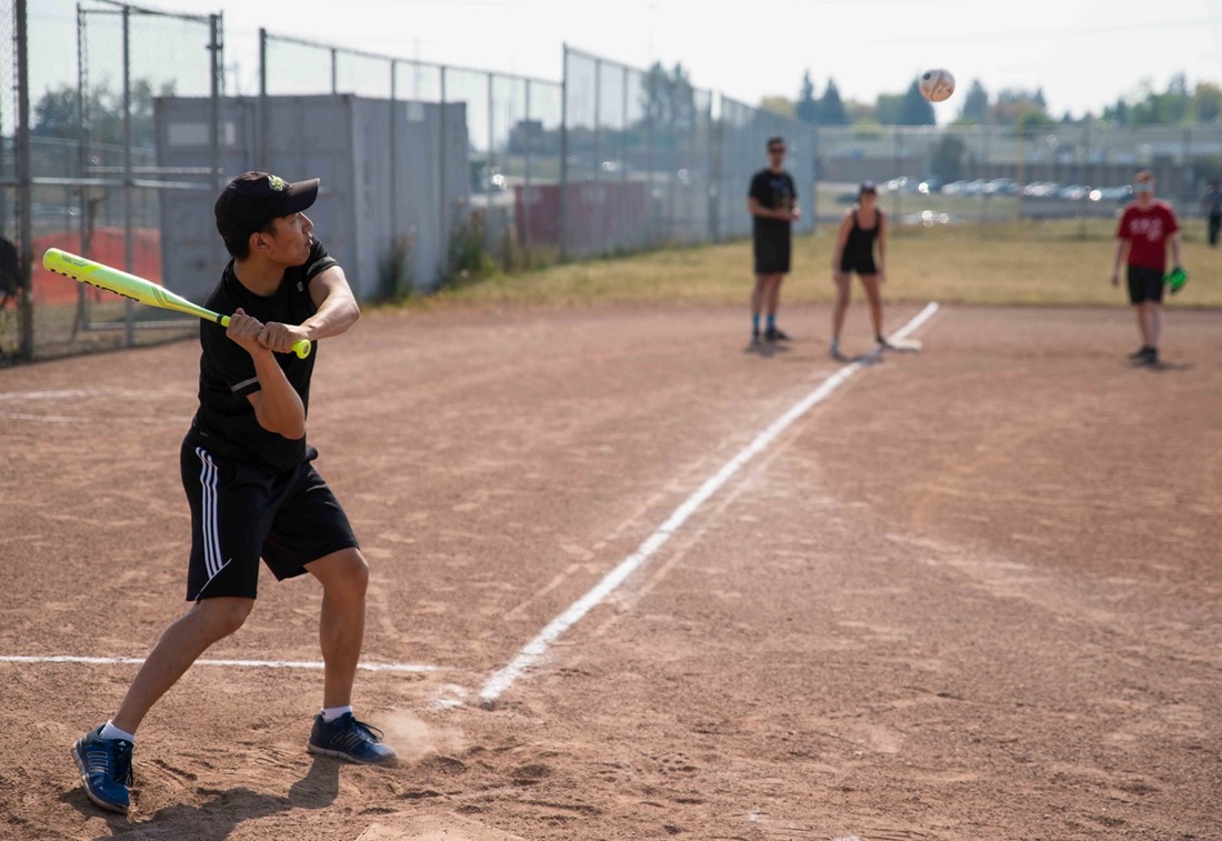 People playing softball