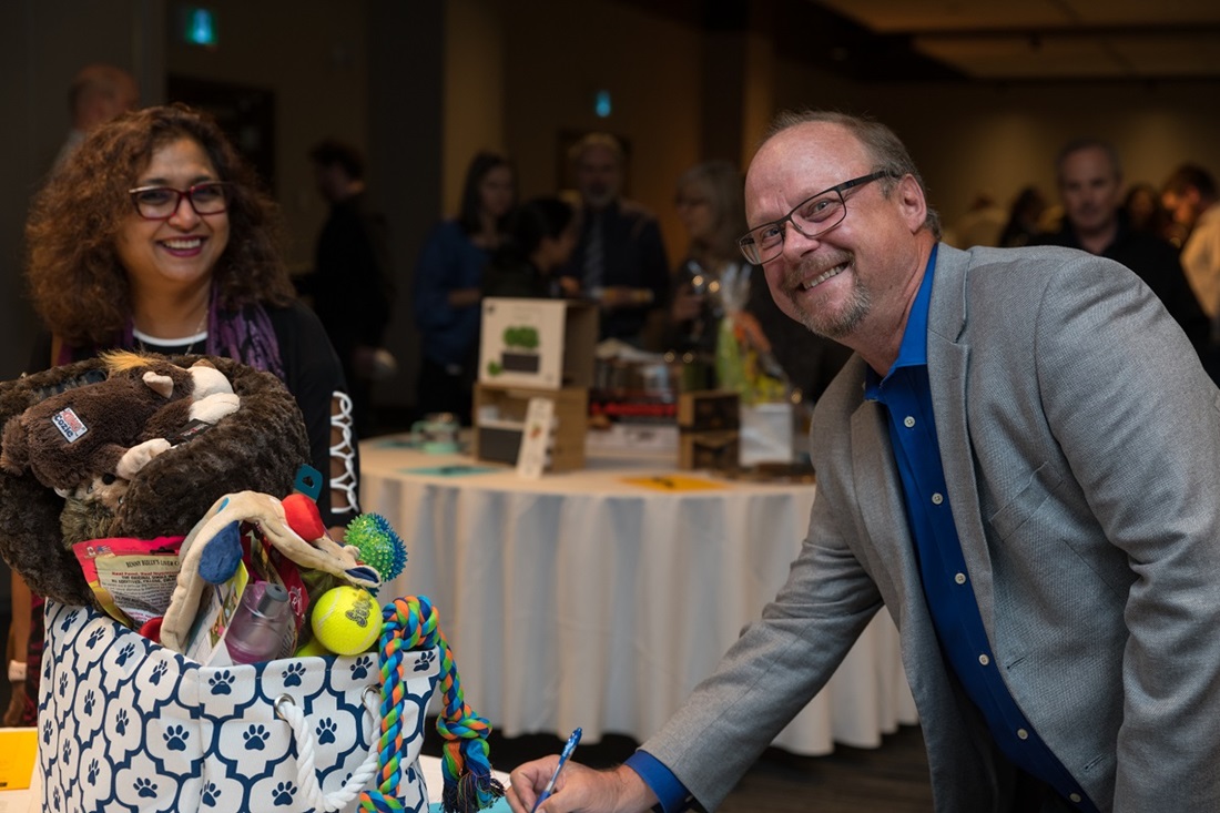 People at a silent auction