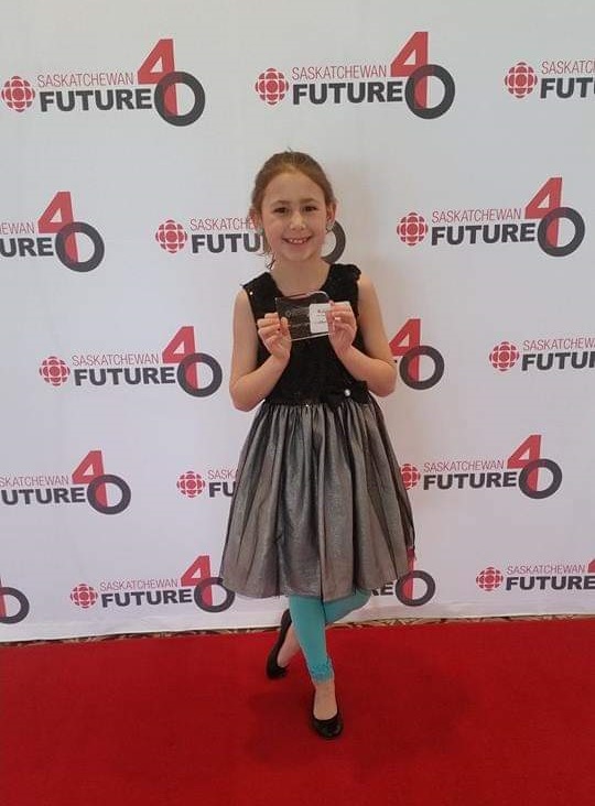 Child at awards show