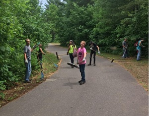 Campers cleaning up a roadside ditch