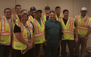 Inspector training graduates class wearing safety vests