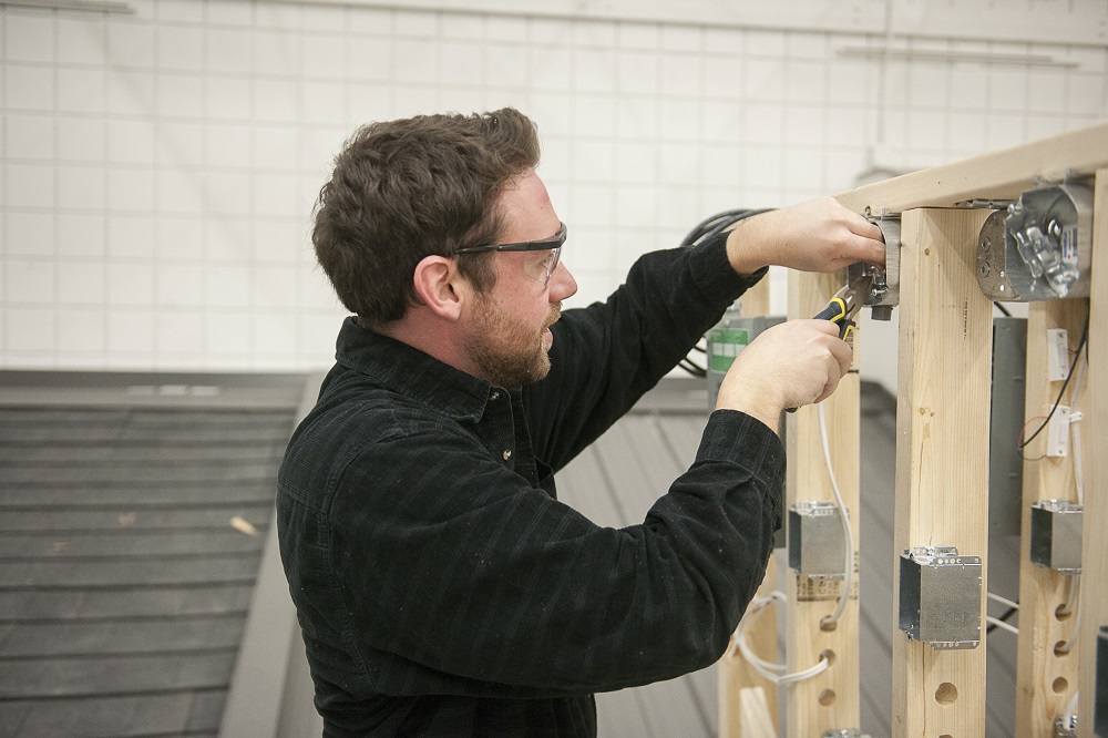 Student working with electrical equipment