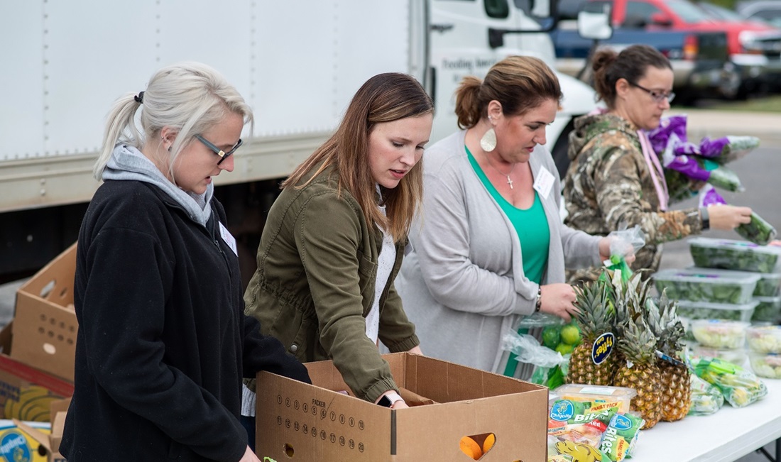 volunteers at Feeding America mobile food bank