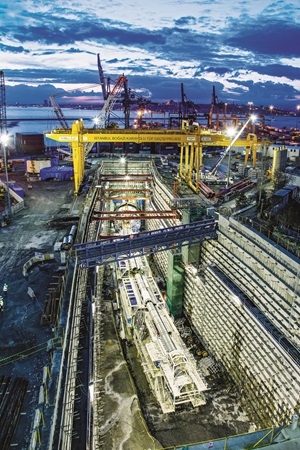 Construction equipment and cranes doing work on an underground tunnel
