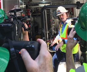 Reporters on a marine vessel tour