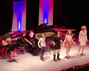 Musical group performing on stage