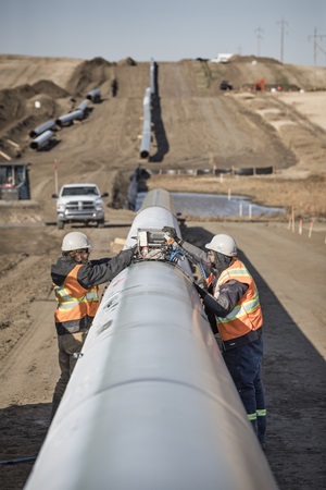 Pipeline workers on right-of-way
