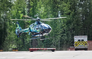 Helicopter among trees