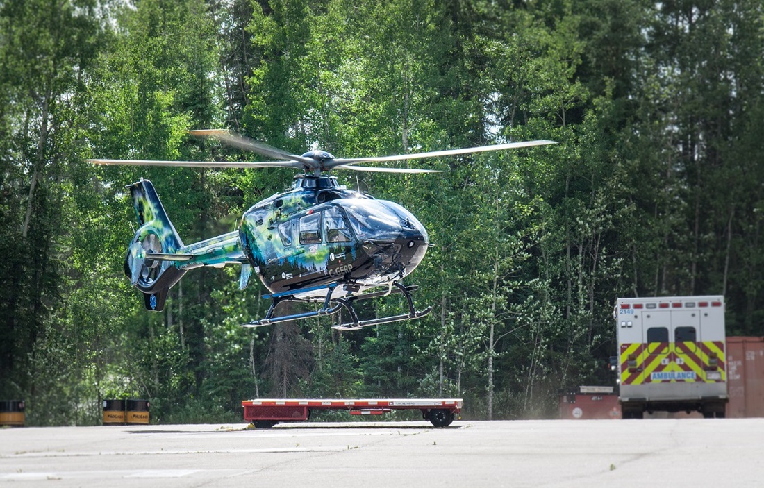 Helicopter among trees