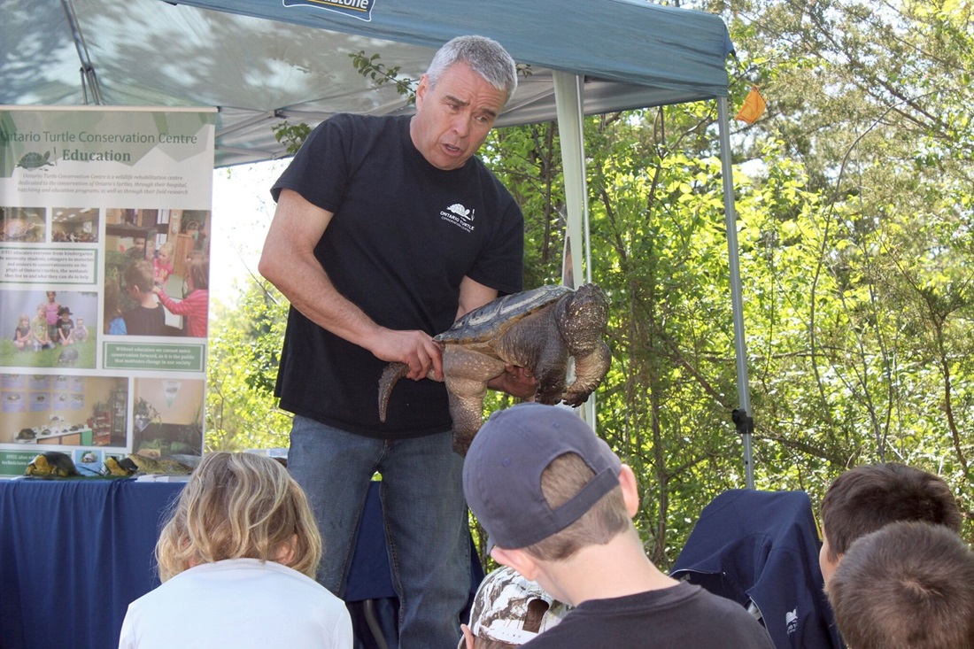 Kids and presenter at a festival