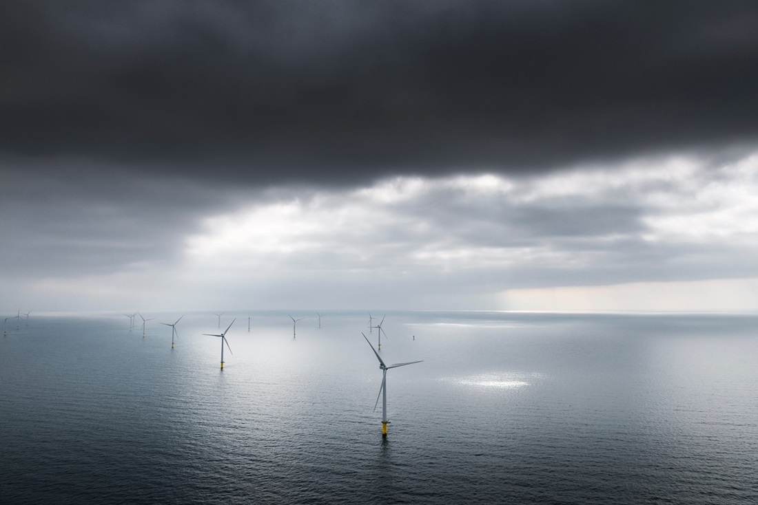 Offshore wind turbines and storm clouds