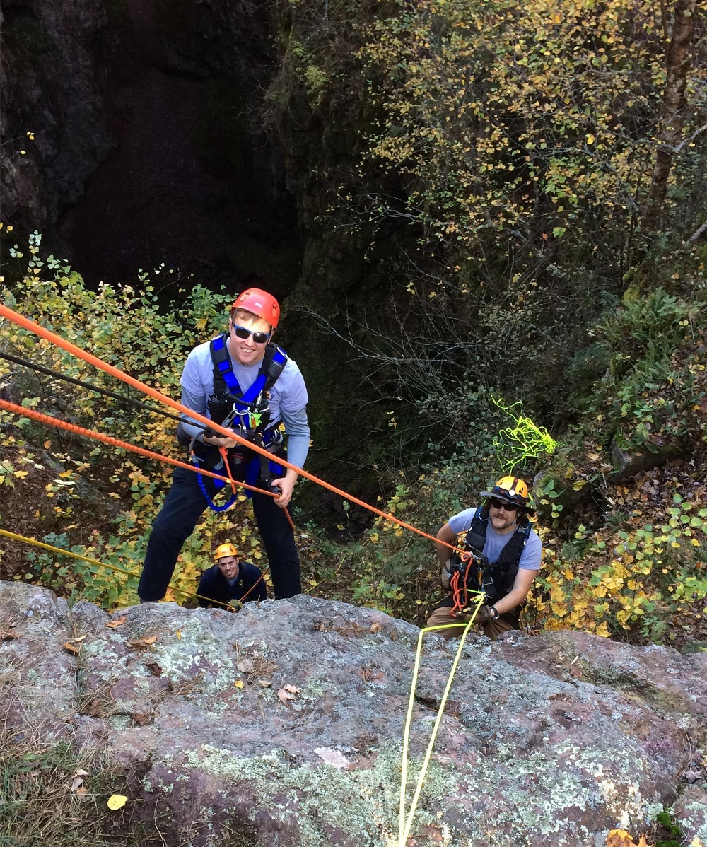 rock climbers on the side of a rock face