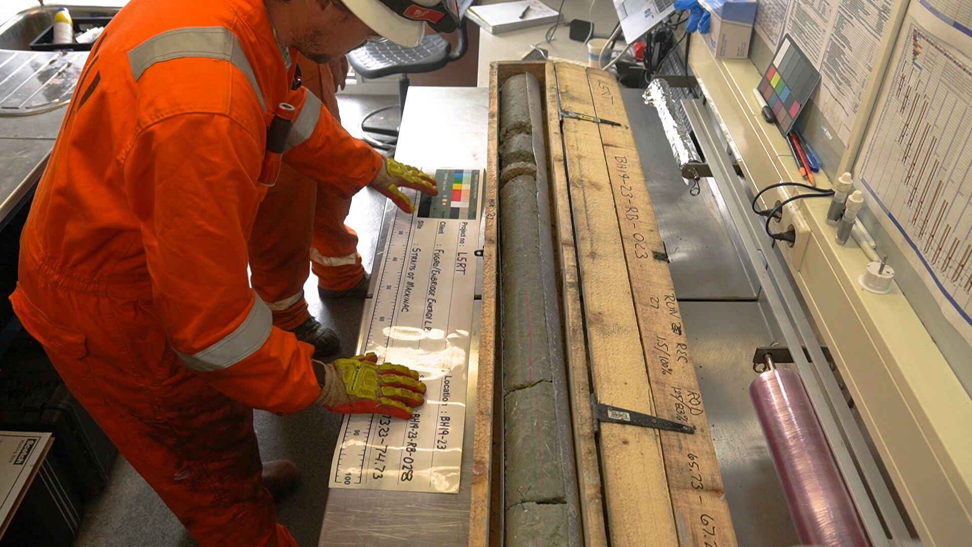 Man studying core sample
