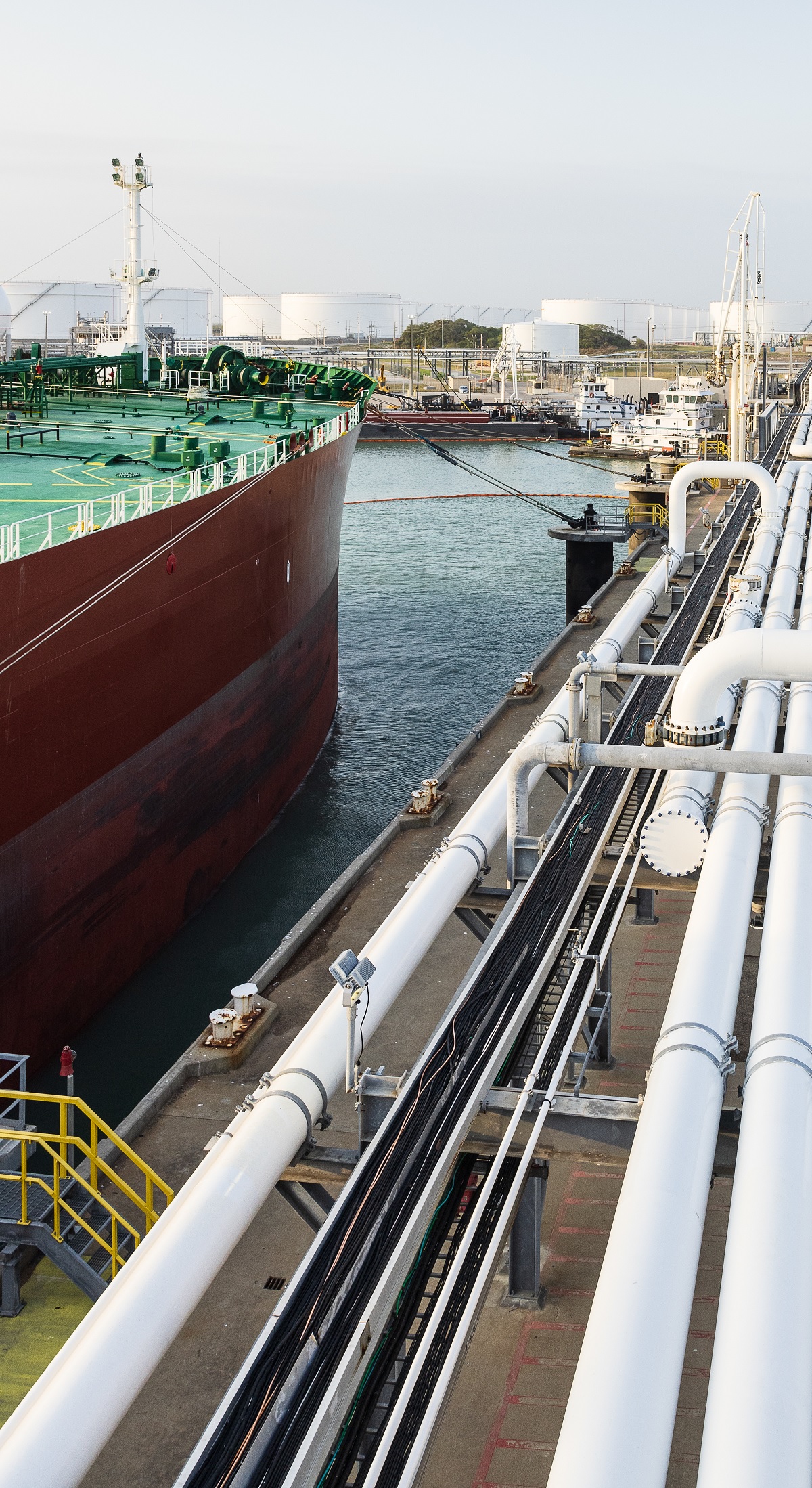 Ship at port and white pipes