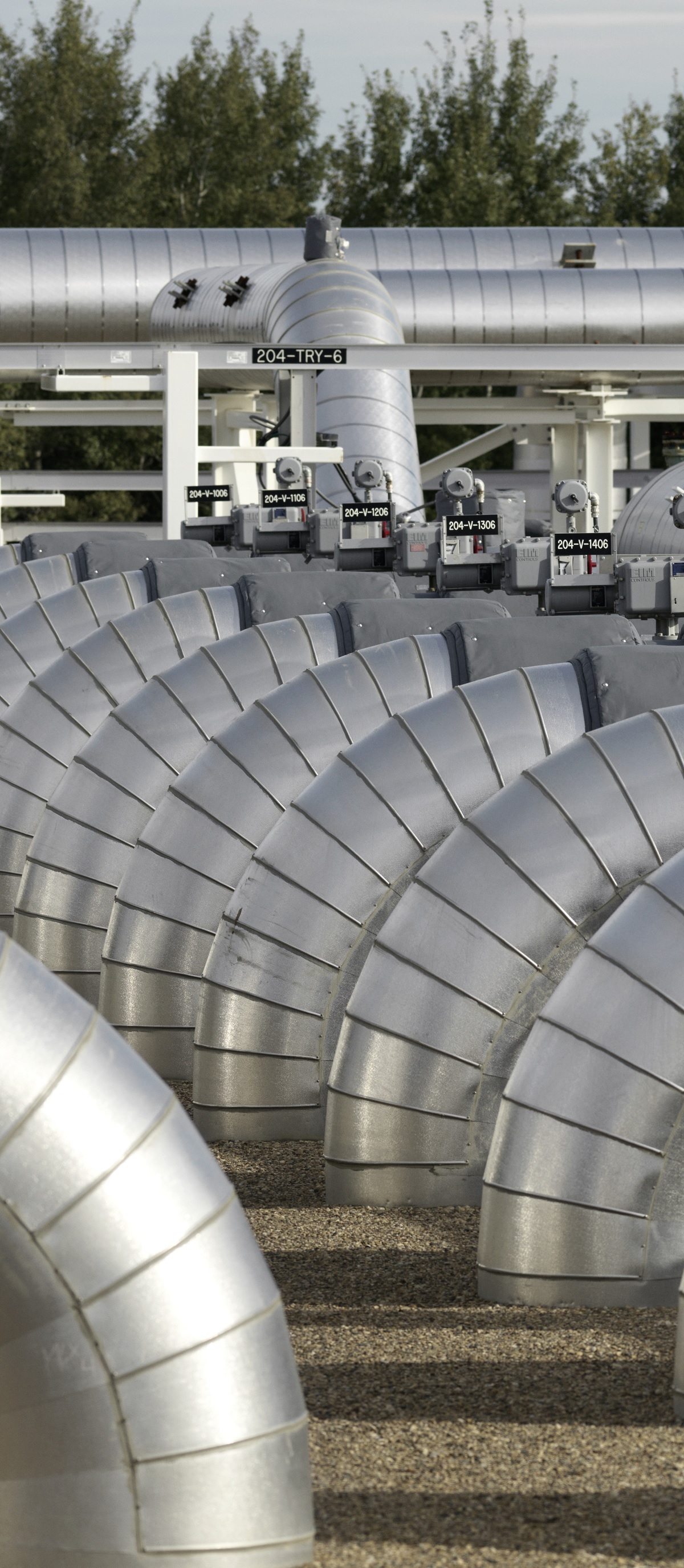 Curved silver pipes