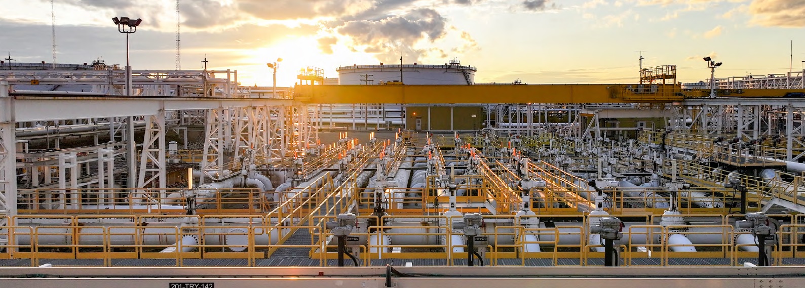 Interconnected pipes at sunrise