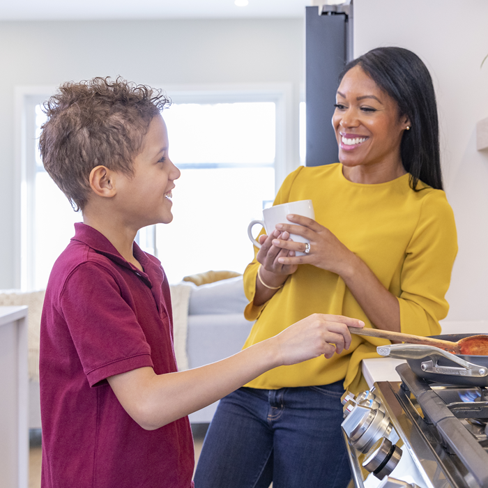 Mother and son in kitchen