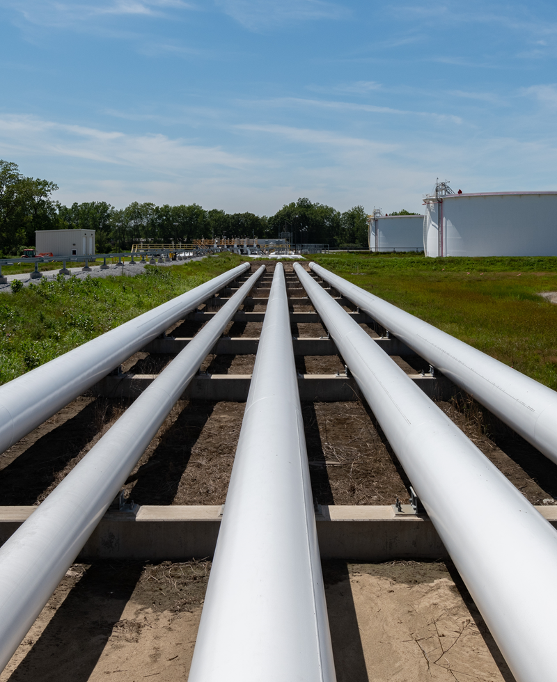 White pipes at a tank facility