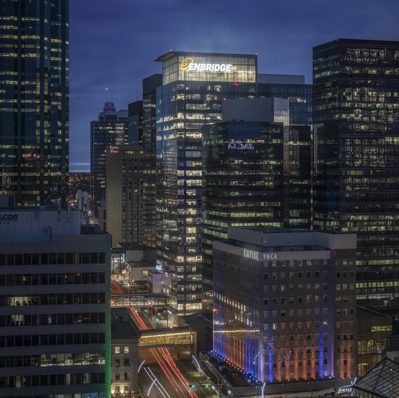 Building with Enbridge sign at night