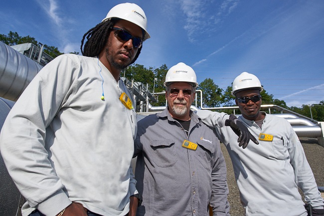Diverse group of employees at a compressor station