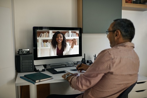 Man watching computer screen