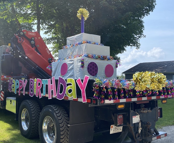 Giant birthday cake float