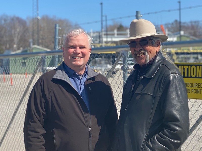 Two men posing for a picture