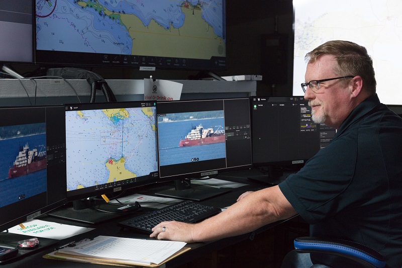 Man watching monitor screens