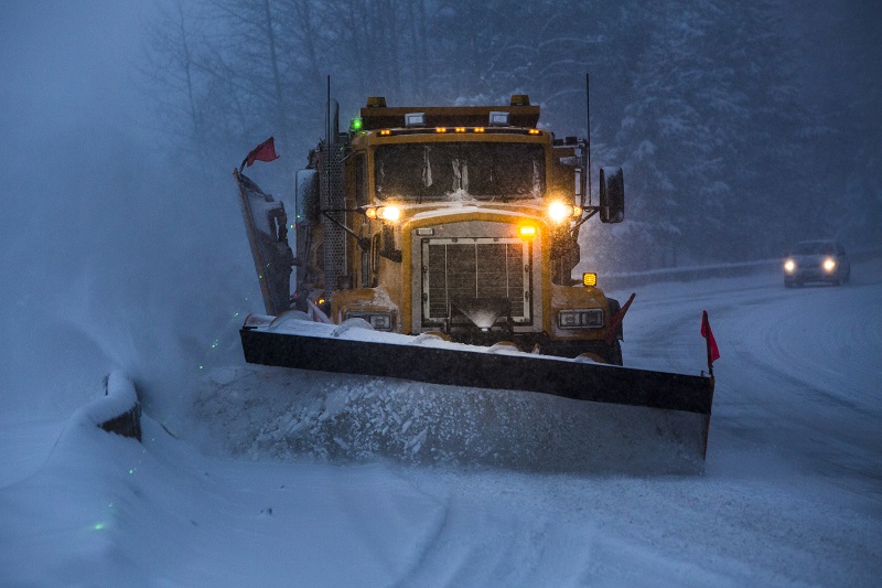 snowplow on a winter road