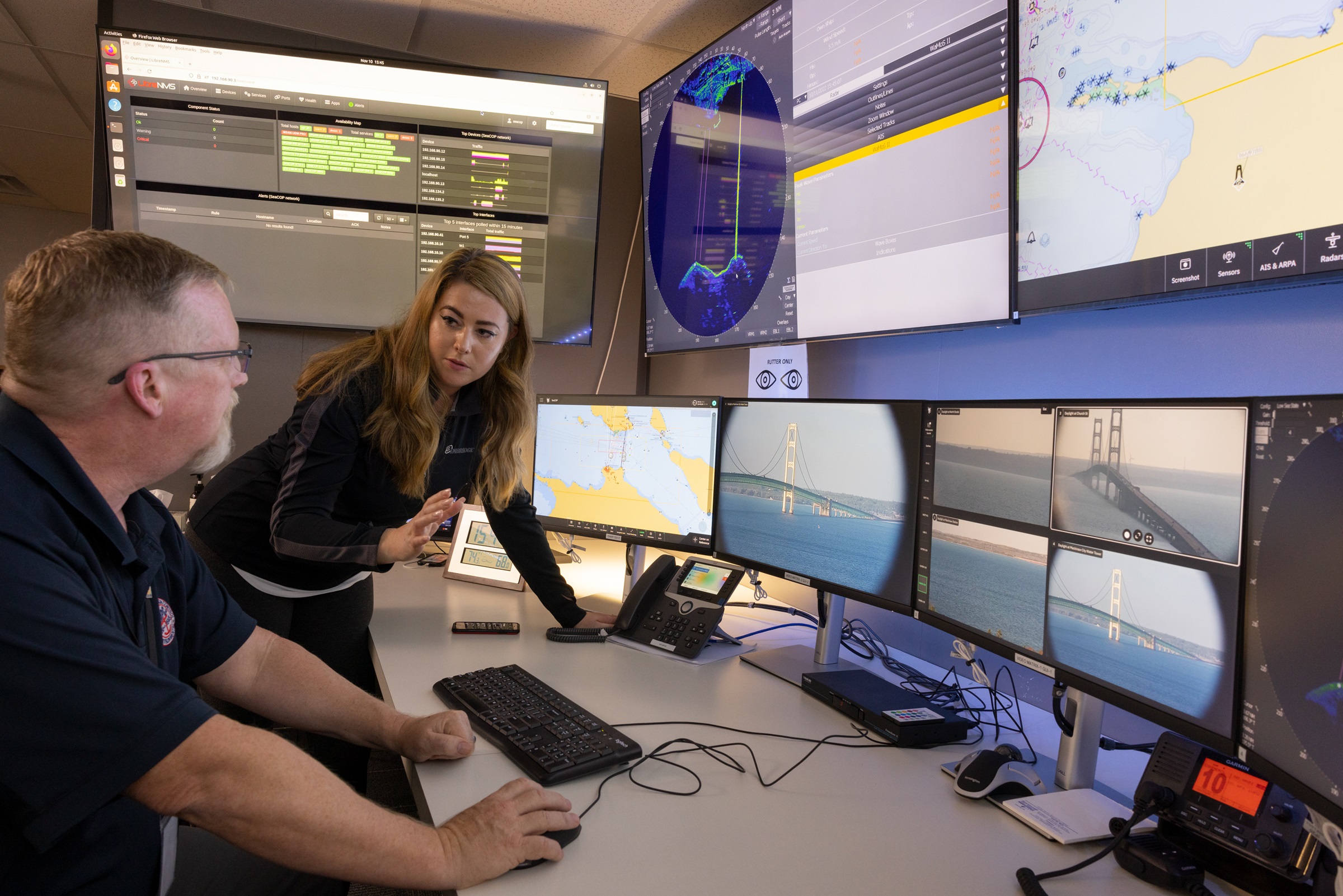 People looking at a screen