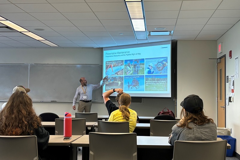 Professor and students in classroom 
