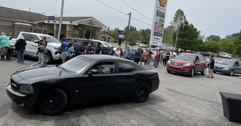 people waiting in long line 