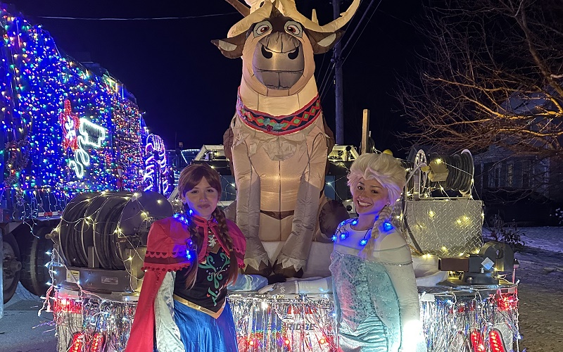 people dressed as Disney Frozen characters for parade