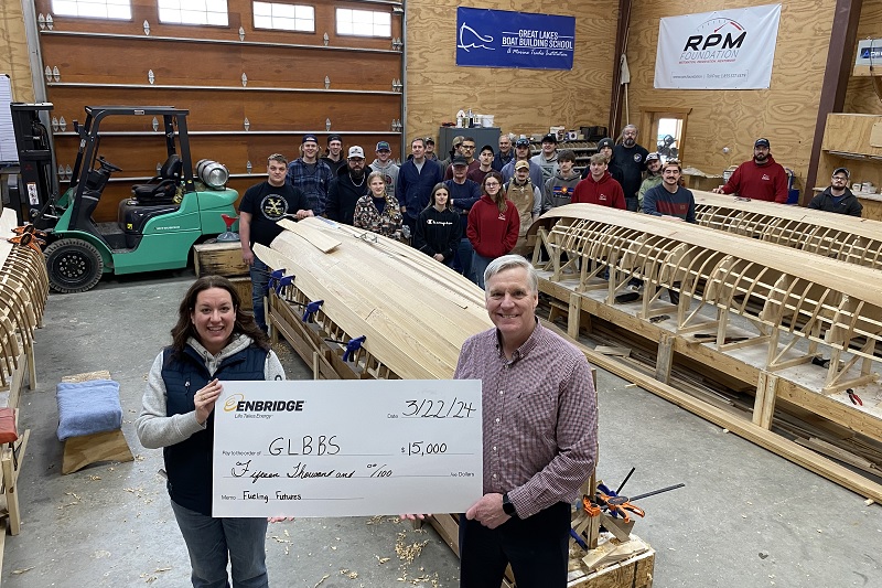 Classroom is gifted a large cheque 