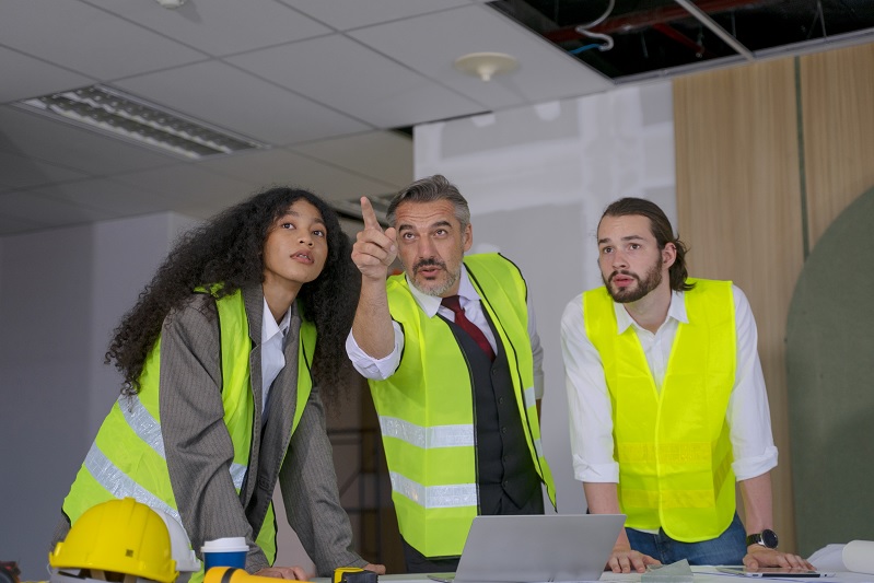 Diverse group of construction works gathered
