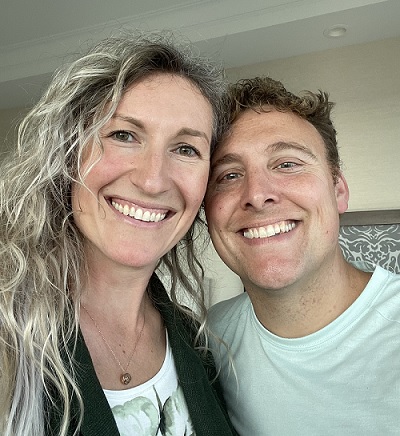 Owners of small business smiling