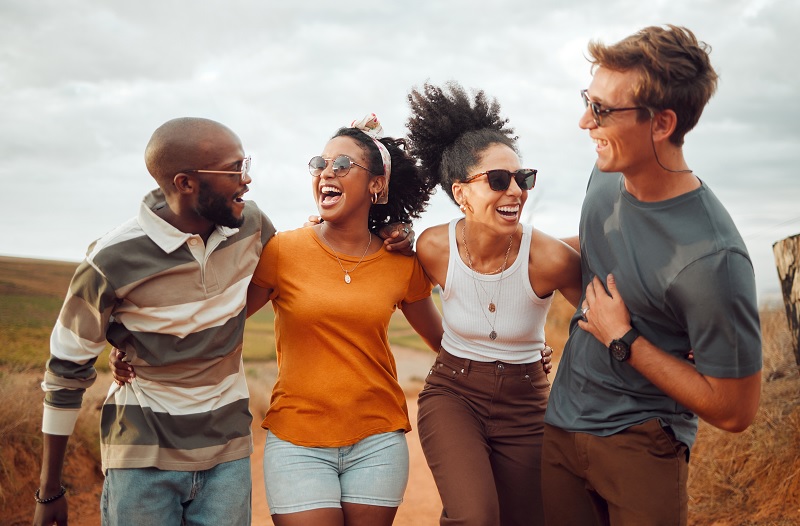 Diverse group of friends wearing sunglasses