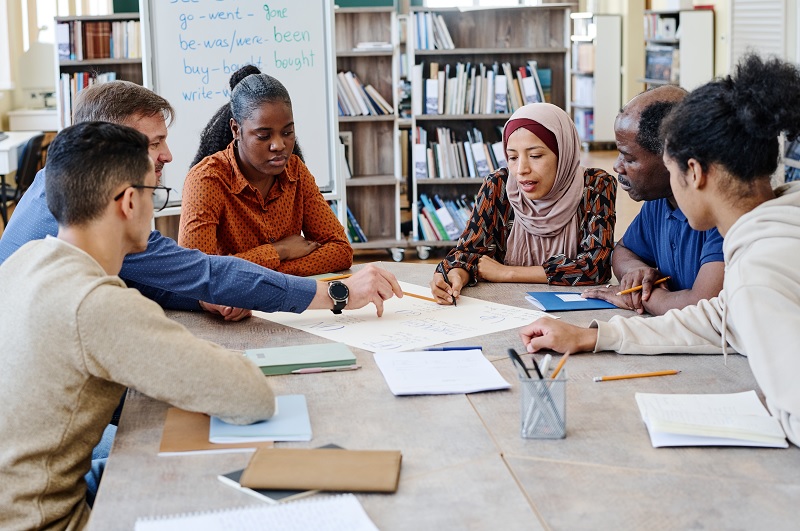 Diverse group of people being mentored 