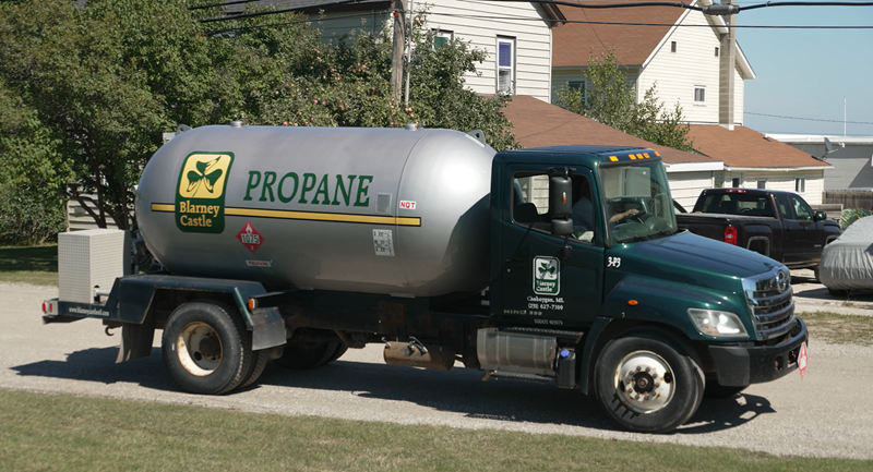 Propane truck in a neighborhood