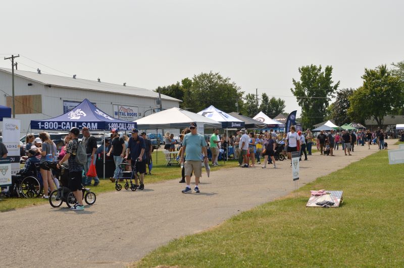 People and tents at an outdoor festival