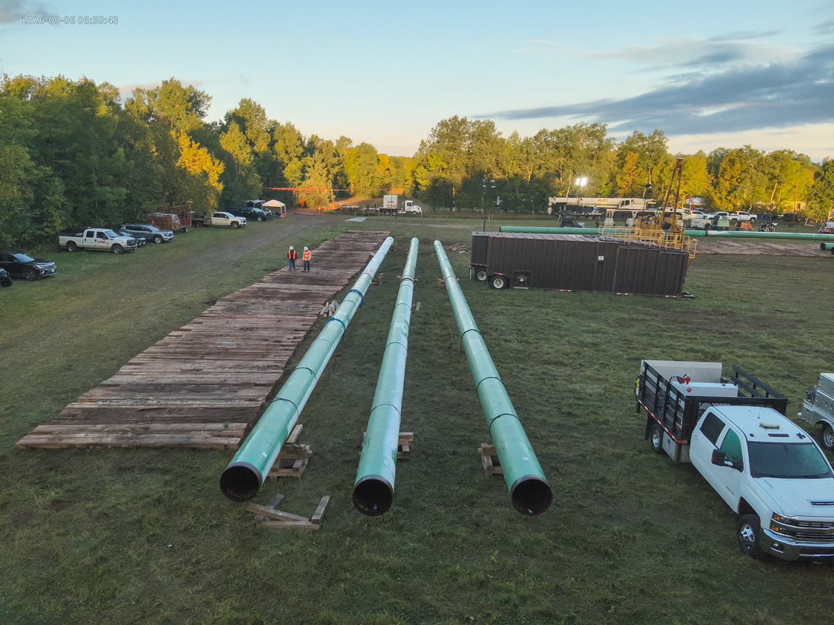 Construction site with lengths of pipe