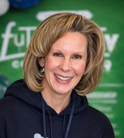 A headshot of a woman