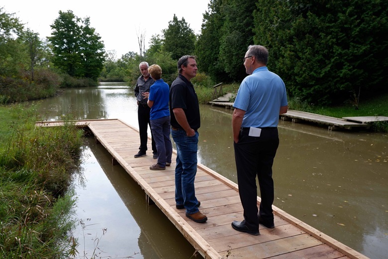 People_standing_on_boardwalk