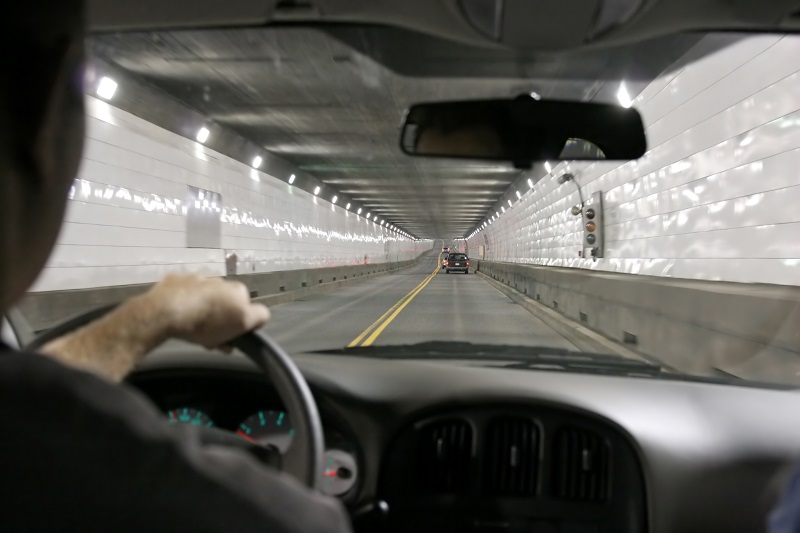 Car driving in a tunnel