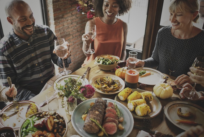 People toasting Thanksgiving dinner