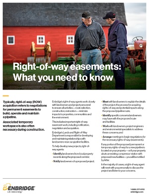 Farmer talking to land agent on his farm